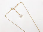 Alphabet G ruby drop pendant
