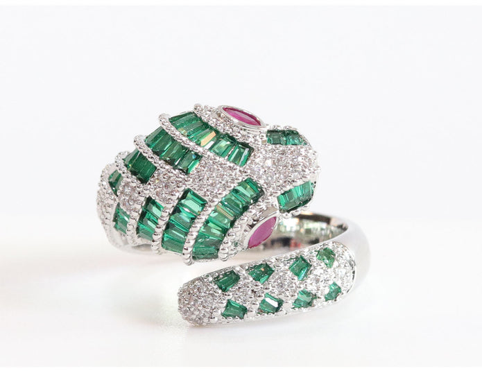 Platinum snake ring with green CZ