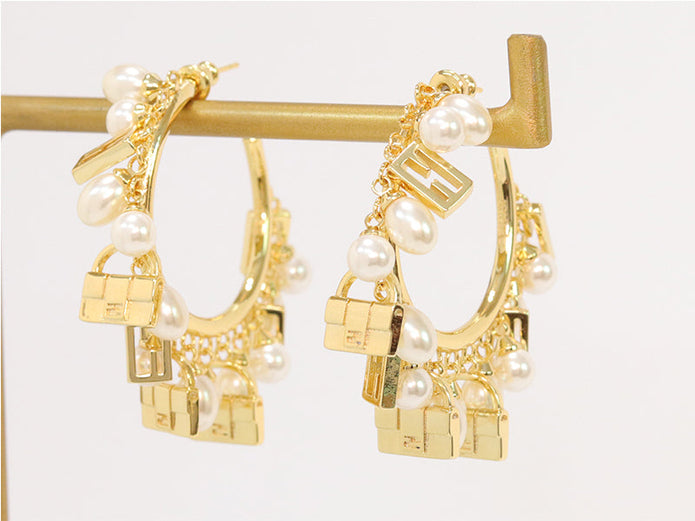 Pearl and charms hoops
