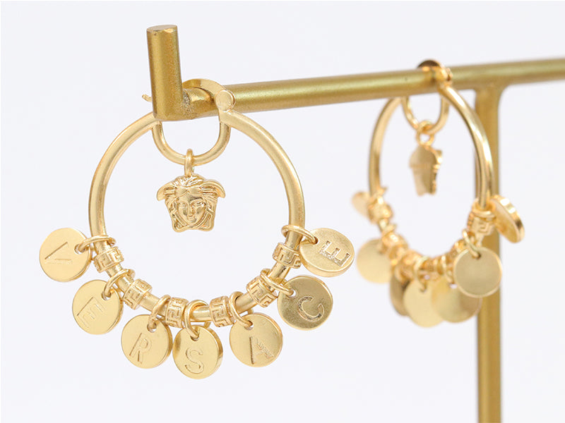 Alphabet embossed charm hoops