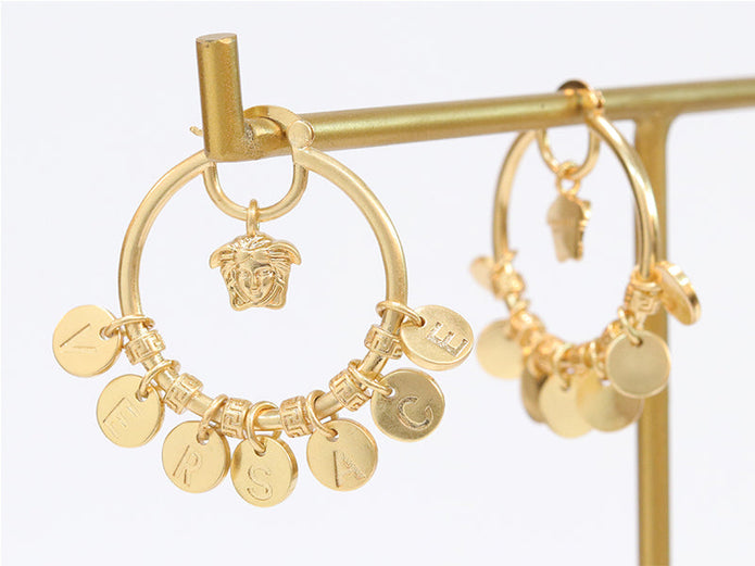 Alphabet embossed charm hoops
