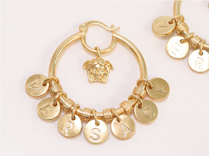 Alphabet embossed charm hoops