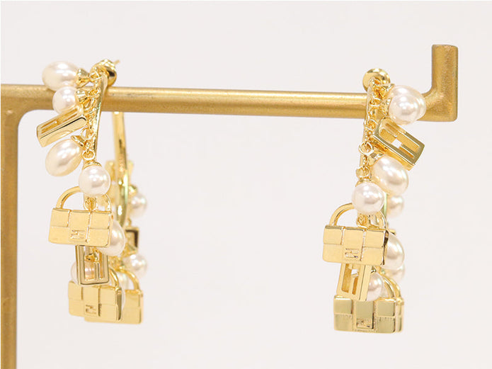 Pearl and charms hoops
