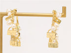 Pearl and charms hoops