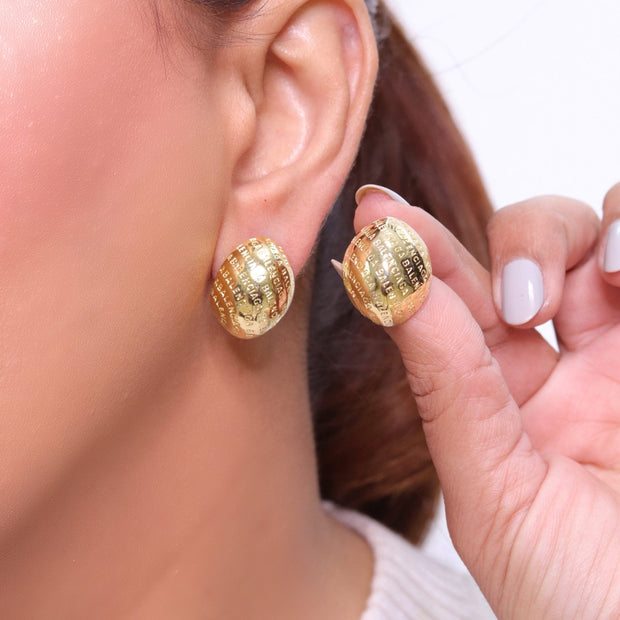Gold alphabet embossed studs