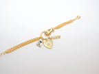 Elegant Gold Charm Bracelet with Heart and Crystal