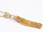 Gold panther face sleek tassel pendant