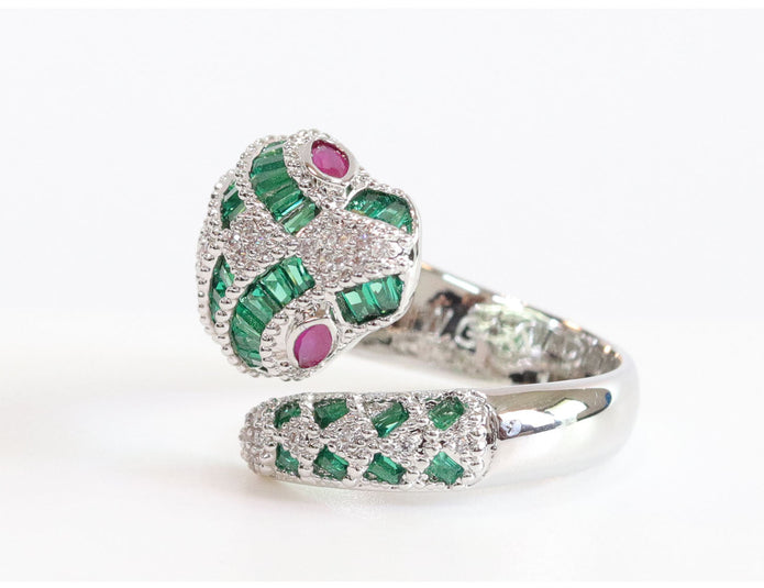 Platinum snake ring with green CZ