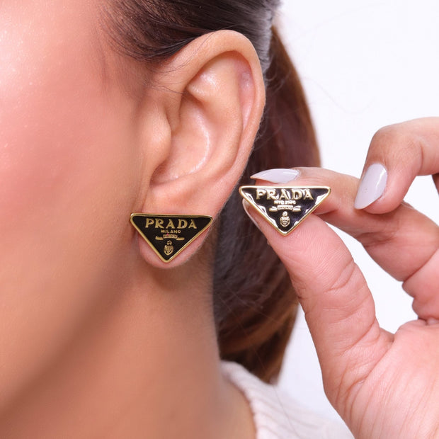 Black & gold enamel studs