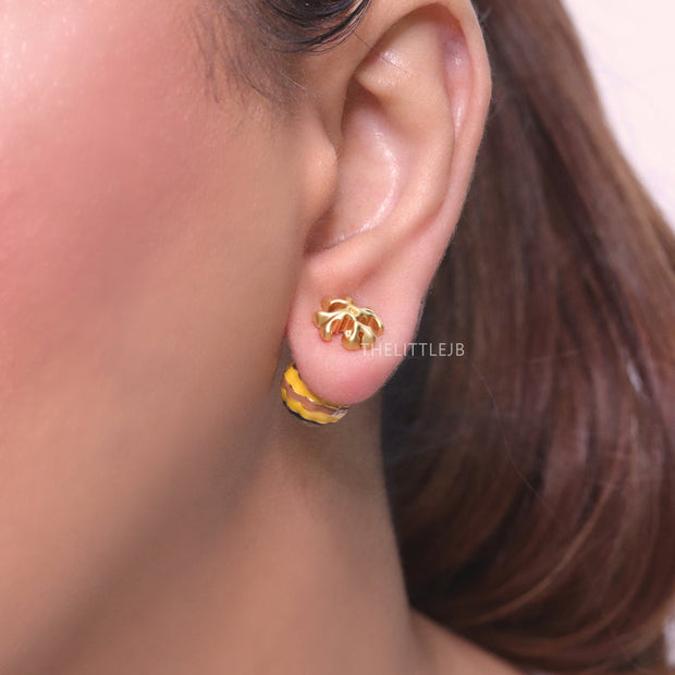 T Motif yellow and blue bomber studs