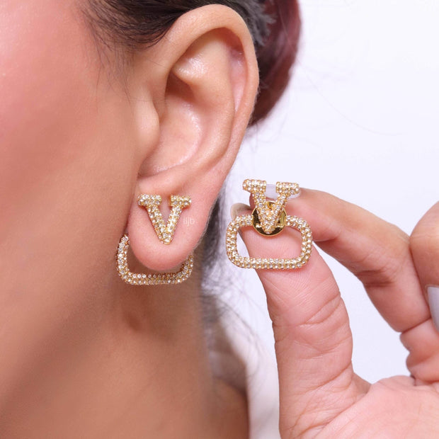 Alphabet V cz studs in gold finish