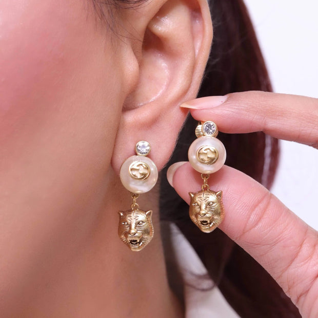 Double G panther pearl dangles in gold finish with CZ