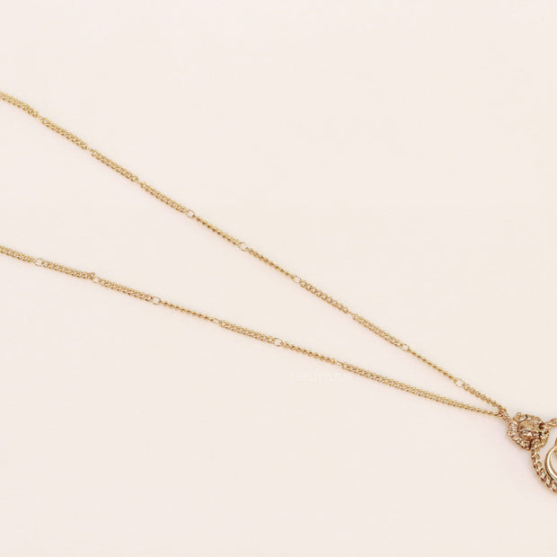 Gold plated lion face and double G initial necklace