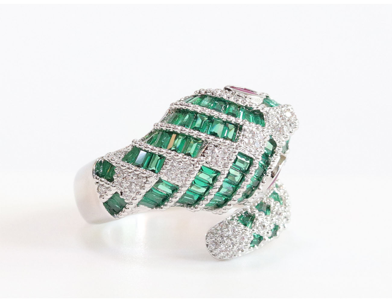 Platinum snake ring with green CZ