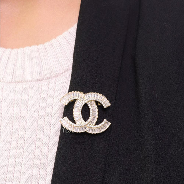 Gold finish Double C alphabet brooch with cz baguette