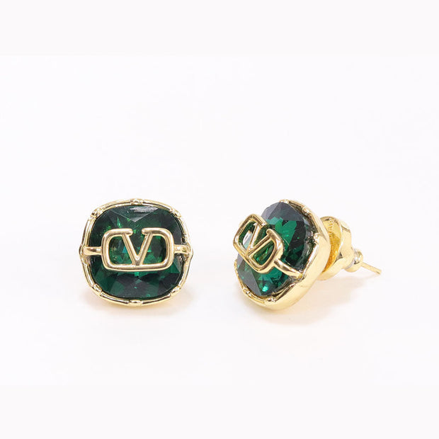 Alphabet V Green and gold studs