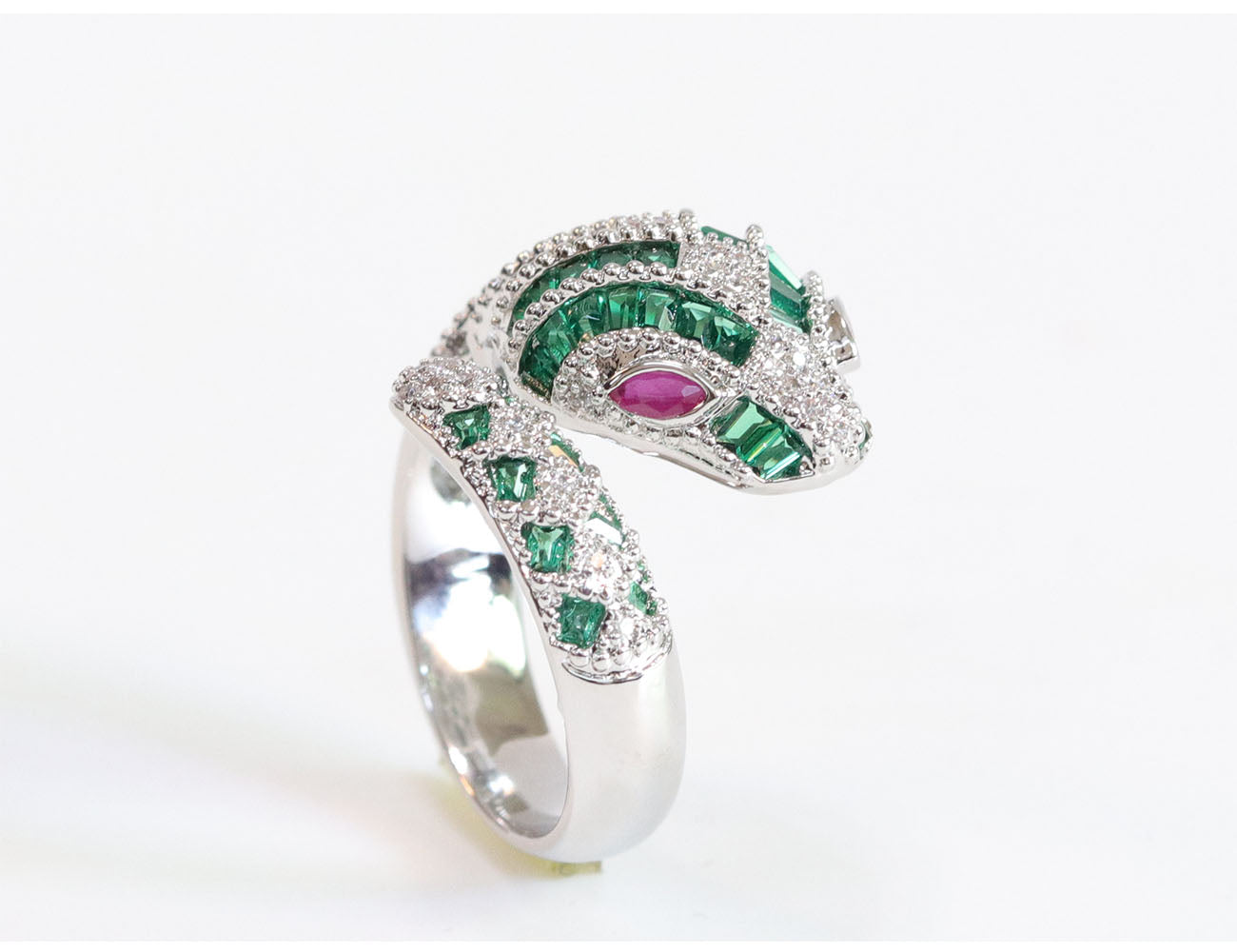 Platinum snake ring with green CZ