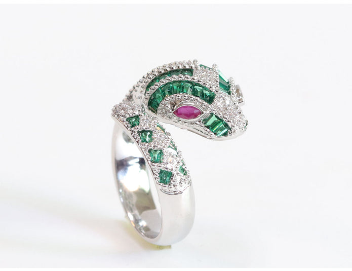 Platinum snake ring with green CZ