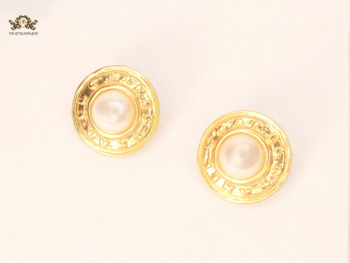Double C pearl studs in Gold