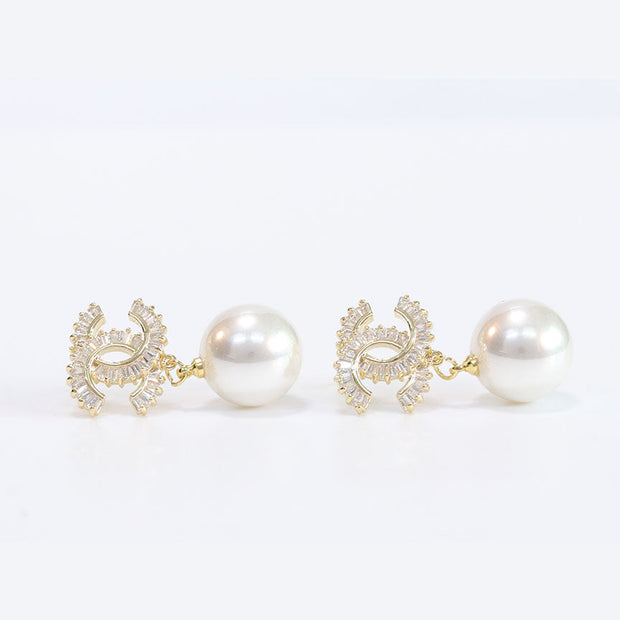 Double C cz baguette and pearl gold earrings