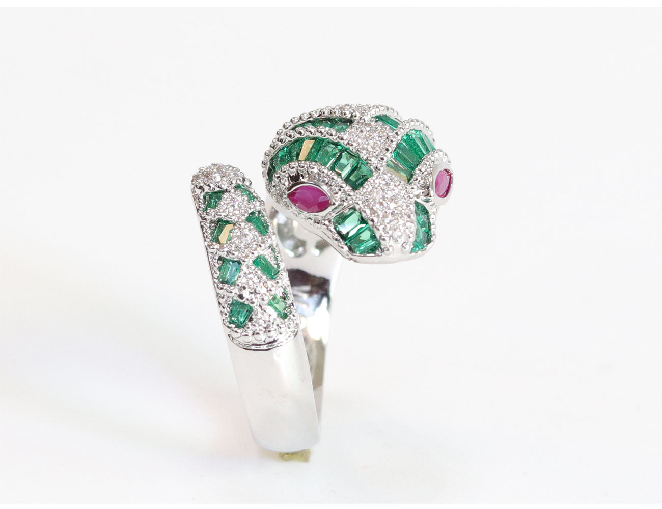 Platinum snake ring with green CZ