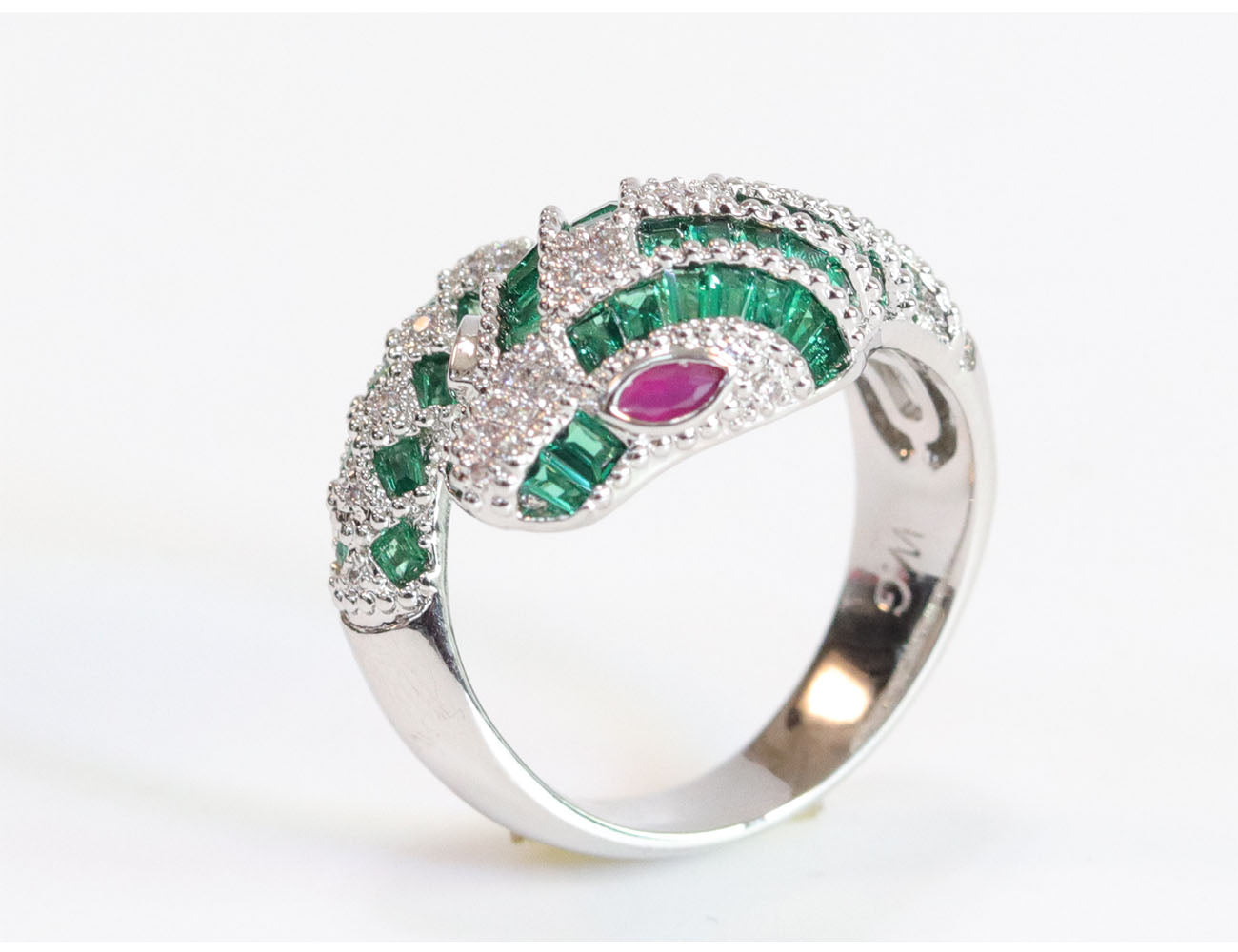 Platinum snake ring with green CZ