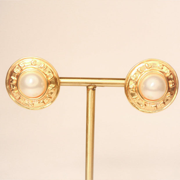 Double C pearl studs in Gold
