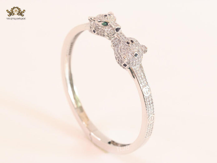 Panther heads platinum plated and emerald bracelet