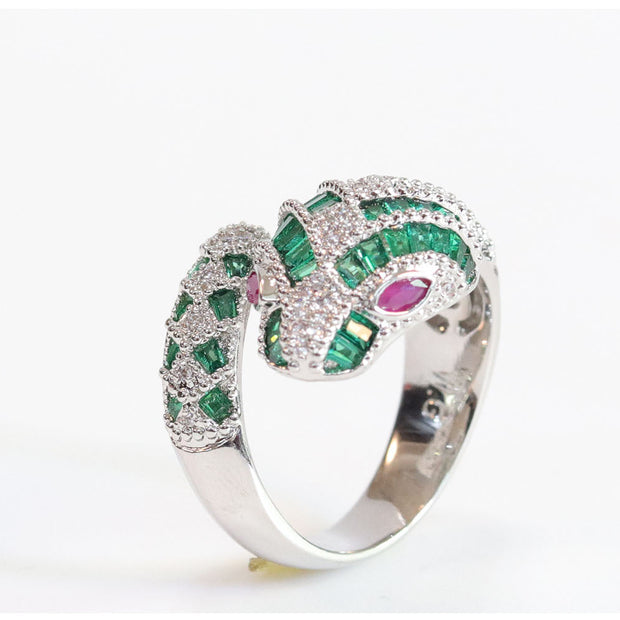 Platinum snake ring with green CZ