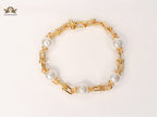 Gold and pearl Tiff & Co linked chain bracelet