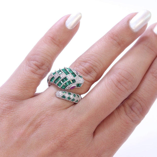 Platinum snake ring with green CZ