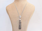 Platinum panther face sleek tassel pendant