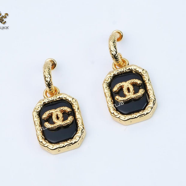 Double C gold foil and black enamel dangles
