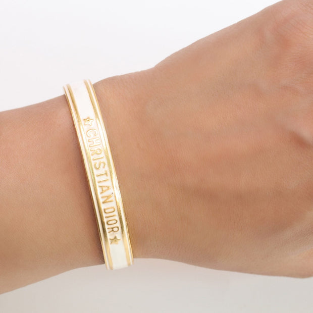 Alphabet C & D white open bracelet in gold finish