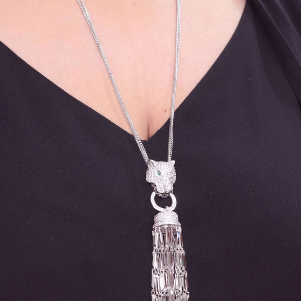 Platinum panther face sleek tassel pendant