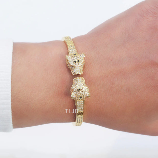 Panther heads gold and emerald bracelet