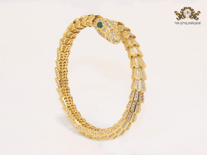 Gold serpentine and cz bracelet