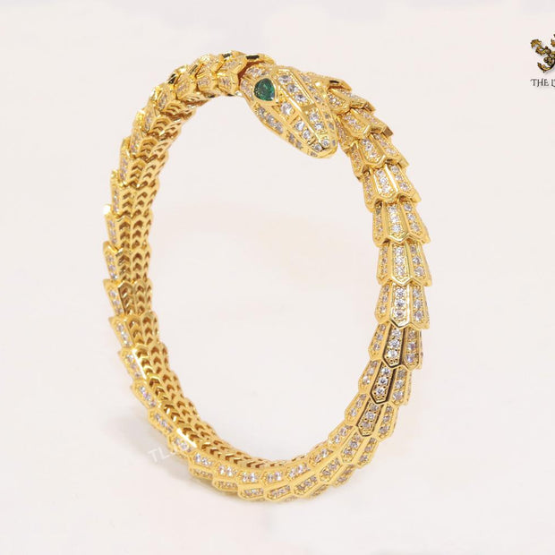 Gold serpentine and cz bracelet