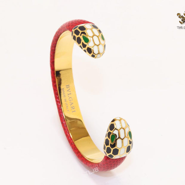 Two snake head red leather bracelet