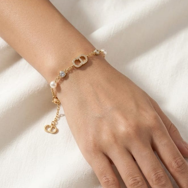 Gold Plated Alphabet CD Bracelet with CZ and Pearl Accents