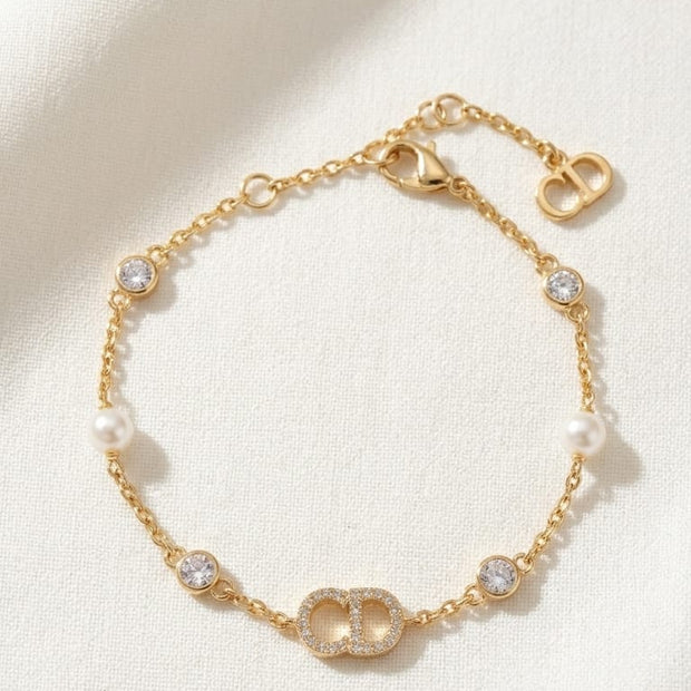Gold Plated Alphabet CD Bracelet with CZ and Pearl Accents
