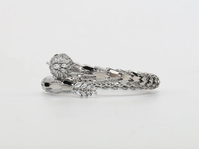 Platinum Snake head cz bracelet with emerald detailing