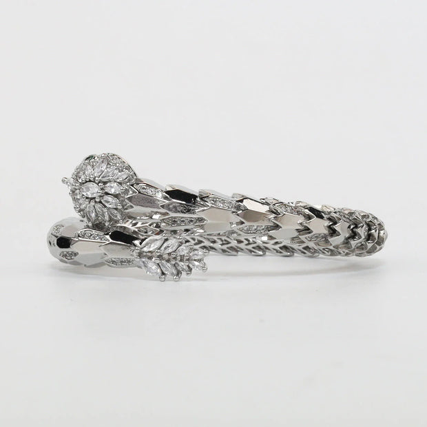 Platinum Snake head cz bracelet with emerald detailing
