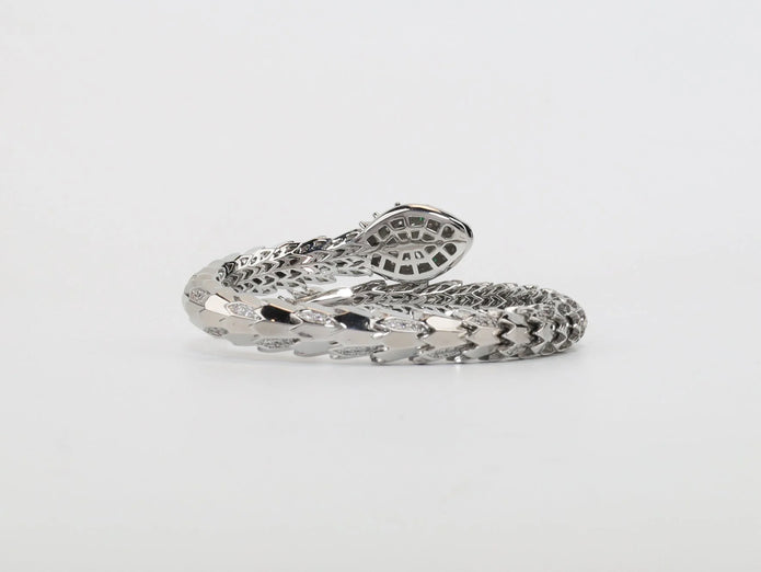 Platinum Snake head cz bracelet with emerald detailing