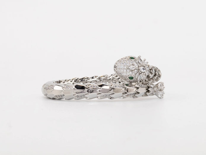 Platinum Snake head cz bracelet with emerald detailing