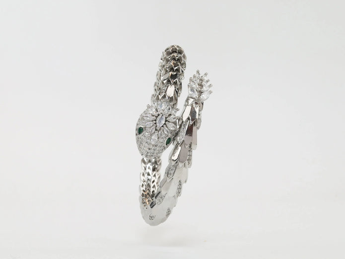 Platinum Snake head cz bracelet with emerald detailing