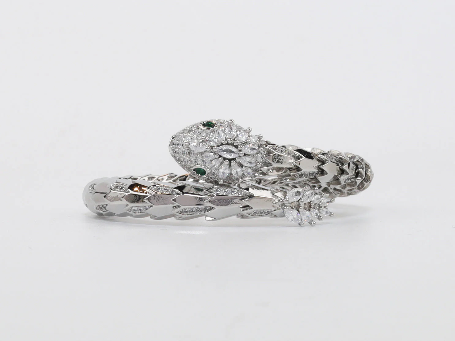 Platinum Snake head cz bracelet with emerald detailing