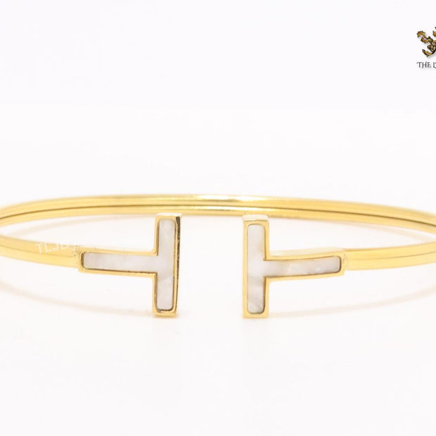 Alphabet T MOP and gold sleek bracelet