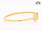 Alphabet T MOP and gold sleek bracelet