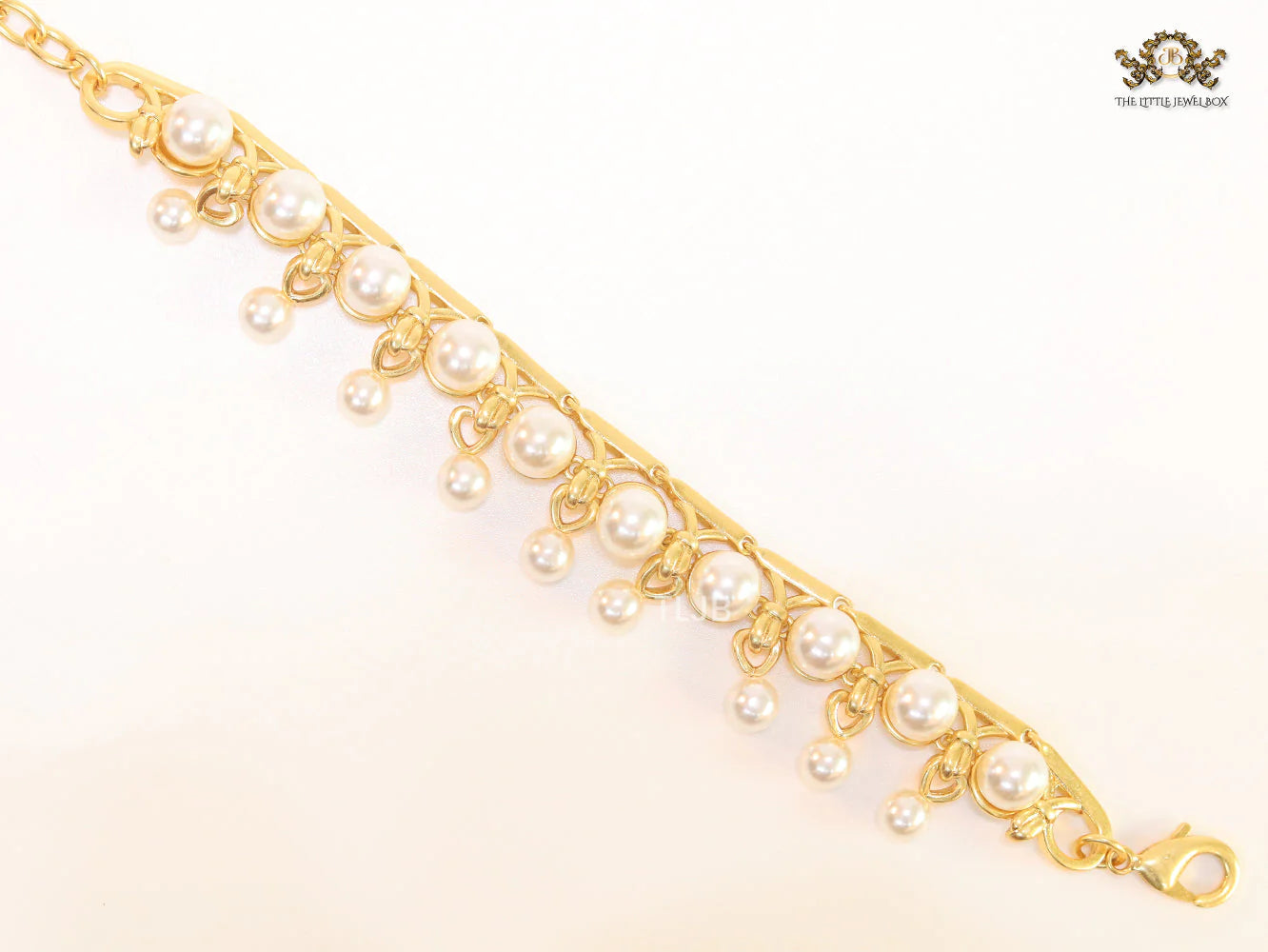 Pearl Studded Alphabet CD Bracelet in Gold